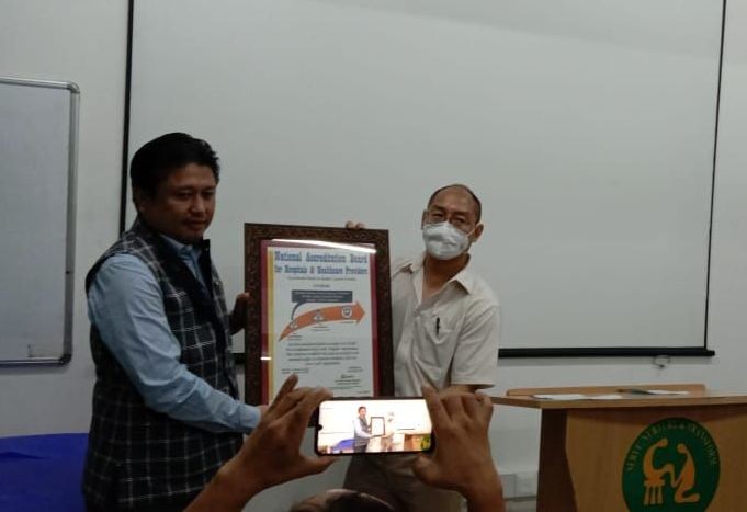 PHED Minister Jacob Zhimomi and CIHSR Director Dr Sedevi unveiling the NABH certificate during the BSL-2 laboratory inauguration programme on June 27. (Morung Photo)